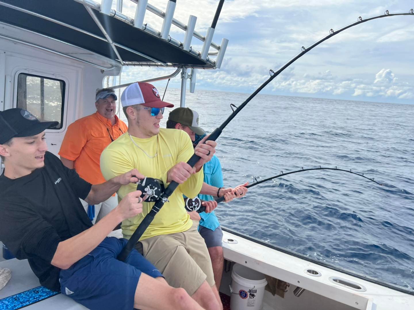 Canvas Print boat fishing trolling in deep blue ocean offshore